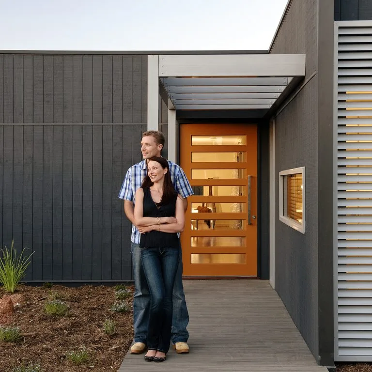 Couple in front of Evolution display home