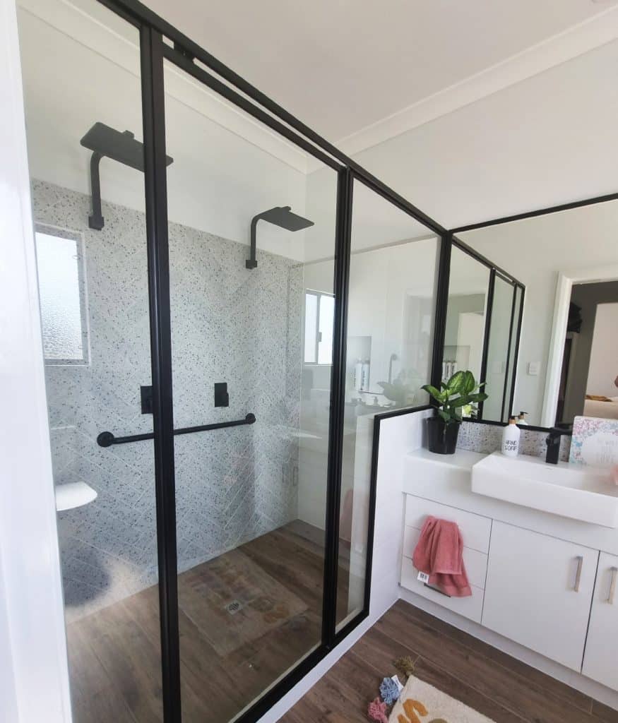 Black support rail in TR Homes modular home bathroom