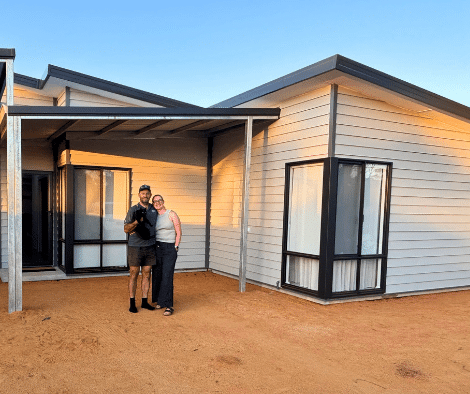 Couple in front of their Hamelin Bay modular home built by TR Homes