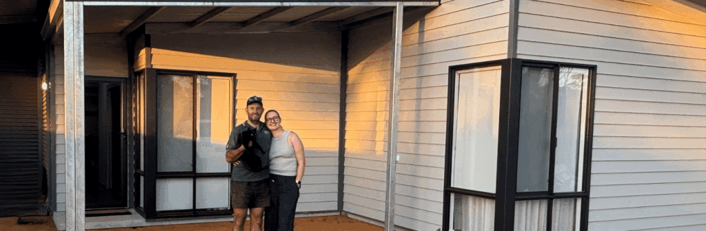 Couple in front of their modular country home in WA