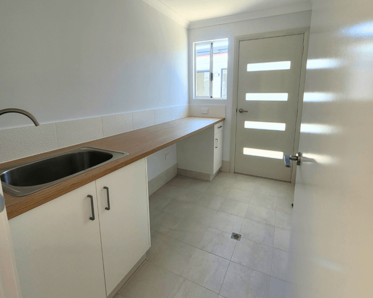 Laundry interior of a modular home in Gibson, WA by TR Homes