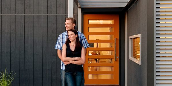 Couple in front of Evolution display home